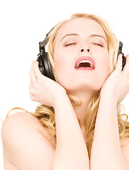 Image showing happy woman in headphones