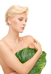 Image showing woman with green leaf