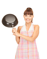Image showing housewife with frying pan