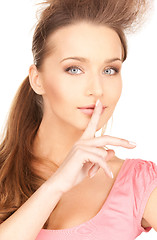 Image showing finger on lips