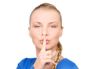 Image showing finger on lips