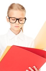 Image showing elementary school student with folders 