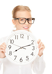 Image showing girl holding big clock