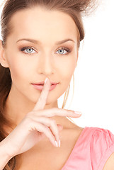 Image showing finger on lips