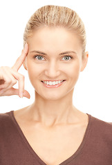 Image showing pensive businesswoman over white