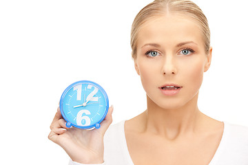 Image showing woman holding alarm clock