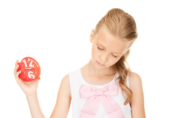 Image showing girl holding alarm clock