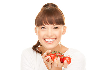 Image showing woman with ripe tomatoes