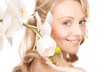 Image showing beautiful woman with white flower