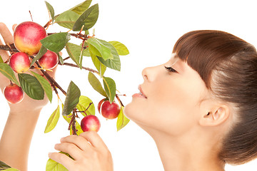 Image showing happy woman with apple twig