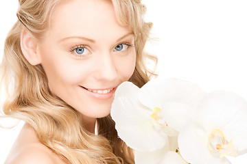 Image showing beautiful woman with white flower