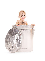 Image showing baby in trash can