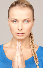 Image showing praying businesswoman