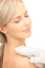 Image showing beautiful woman in white mittens