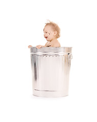 Image showing baby in trash can