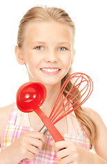 Image showing little housewife with red ladle