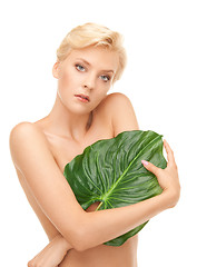 Image showing woman with green leaf