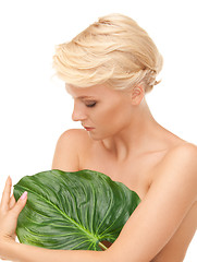 Image showing woman with green leaf