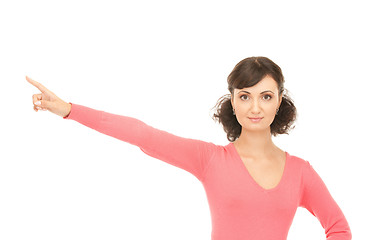 Image showing attractive businesswoman pointing her finger