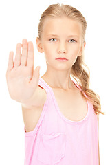 Image showing lovely girl showing stop sign