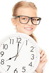 Image showing picture of girl holding big clock