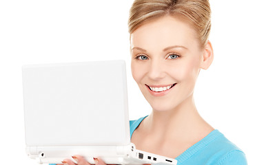 Image showing happy woman with laptop computer