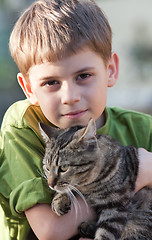 Image showing Boy and cat