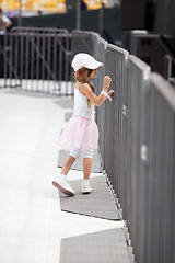 Image showing Adorable little girl on the stadium