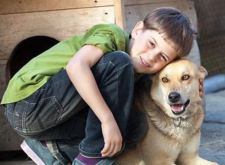 Image showing Boy with dog