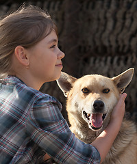 Image showing Girl with dog