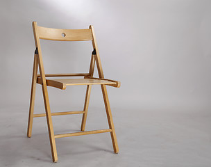 Image showing A wood foldable chair