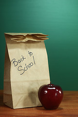 Image showing School Lunch Sack Sitting on Teacher Desk