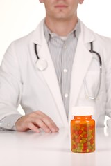 Image showing Doctor With Medication in Prescription Bottles