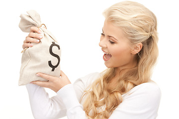 Image showing woman with dollar signed bag