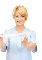 Image showing doctor with toothbrush