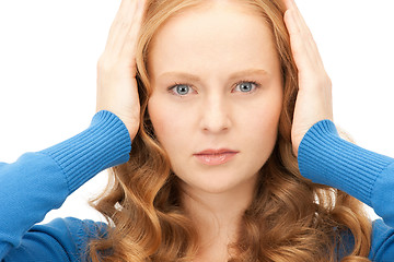 Image showing woman with hands on ears