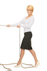 Image showing business woman pulling rope