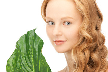 Image showing woman with green leaf