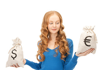 Image showing woman with euro and dollar bags