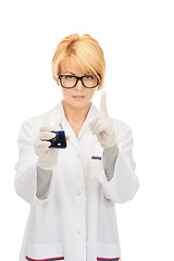 Image showing lab worker holding up test tube