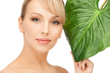 Image showing woman with green leaf