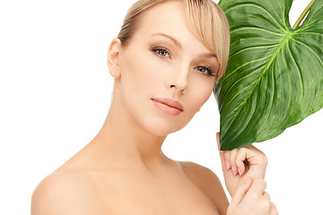 Image showing woman with green leaf