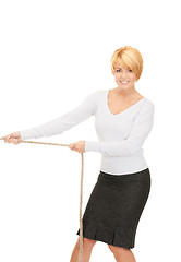 Image showing business woman pulling rope