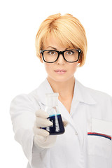 Image showing lab worker holding up test tube