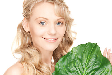 Image showing woman with green leaf