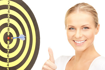 Image showing businesswoman with dart and target