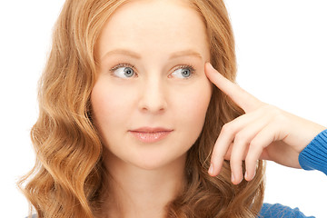 Image showing pensive businesswoman over white