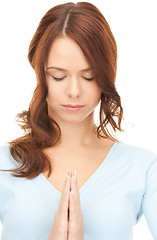 Image showing praying businesswoman