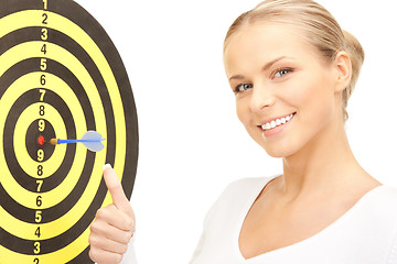 Image showing businesswoman with dart and target