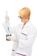 Image showing lab worker holding up test tube